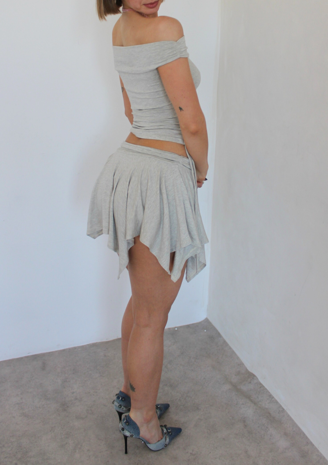 Bella mini skirt in grey size 8/10 sample