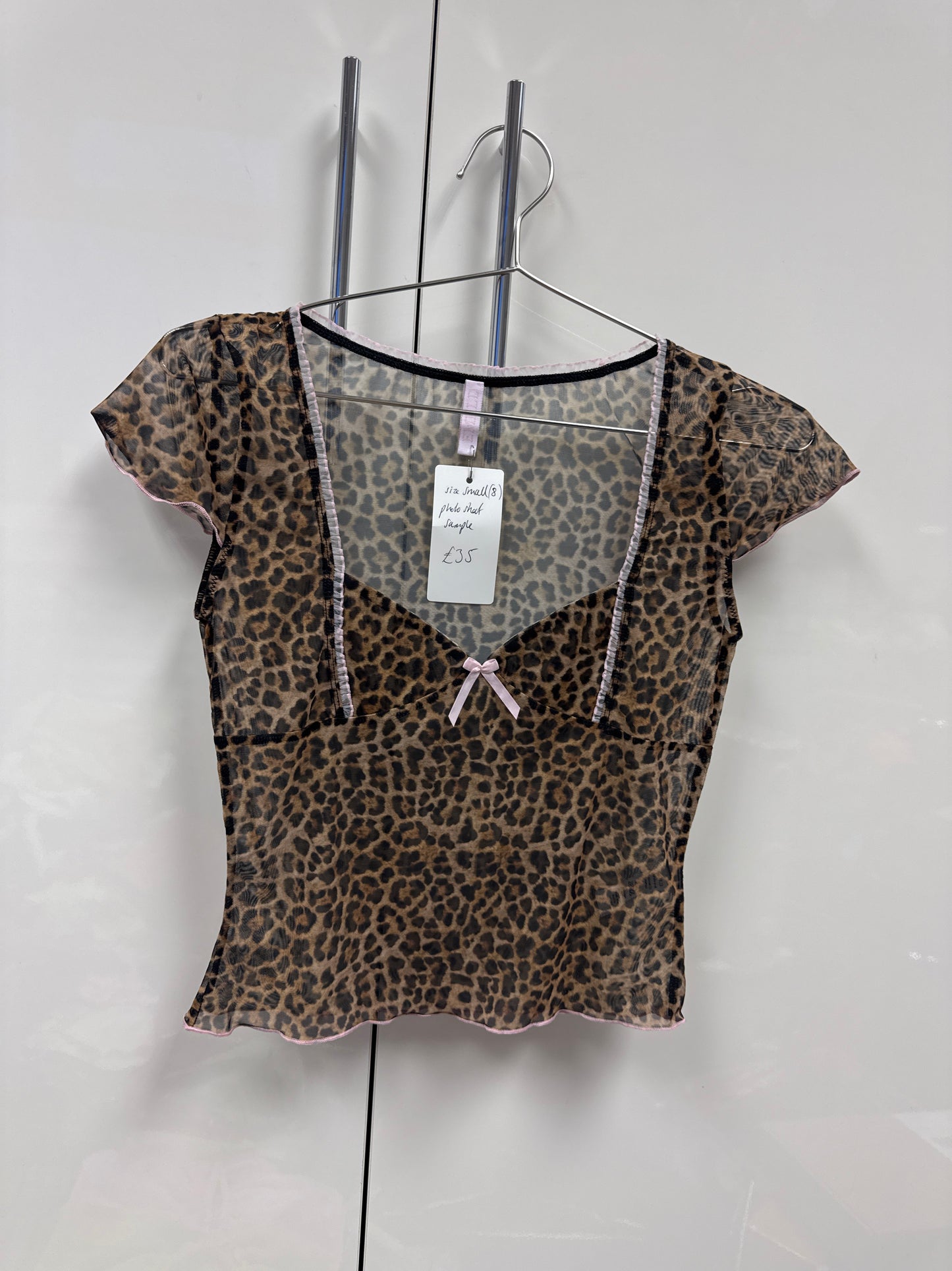 Leopard cap sleeve top photo sample