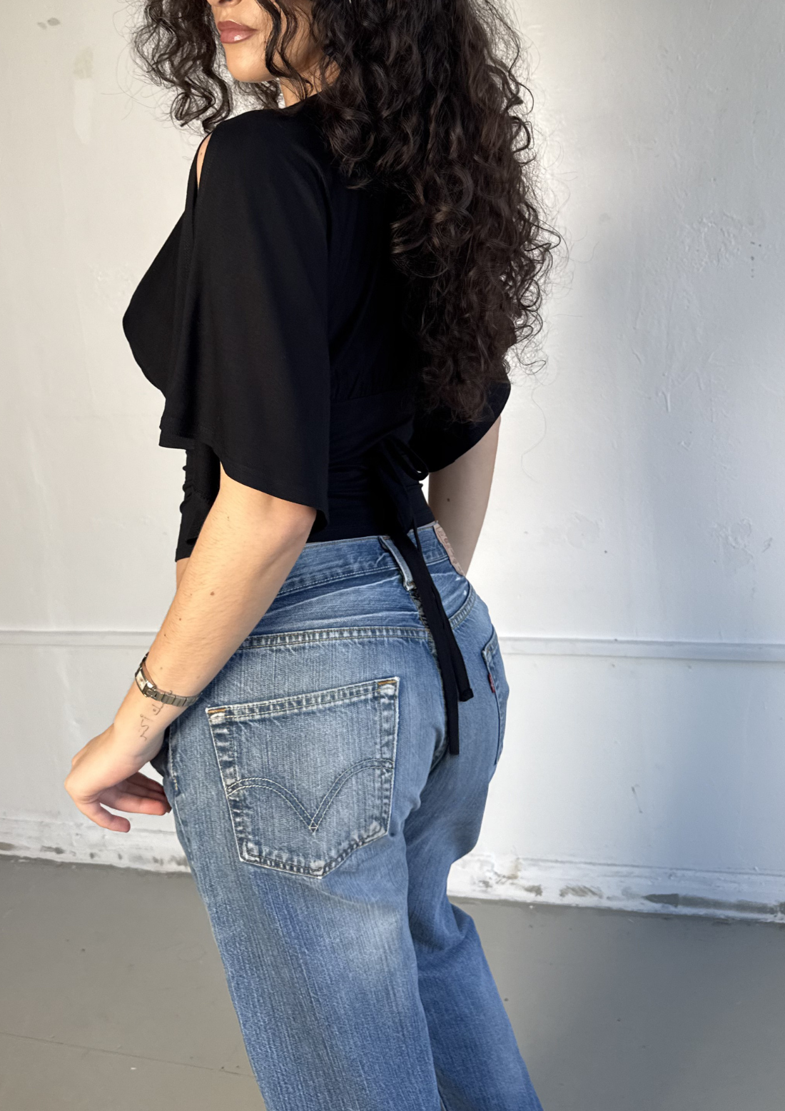 The Yasmin plunge split sleeve top in Black