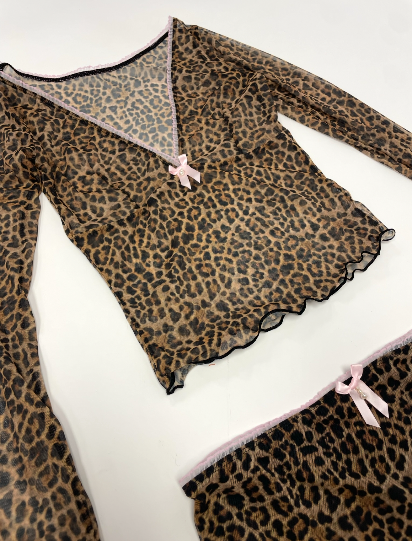 Long Line Top In Leopard With Bow Detail size 12 / L