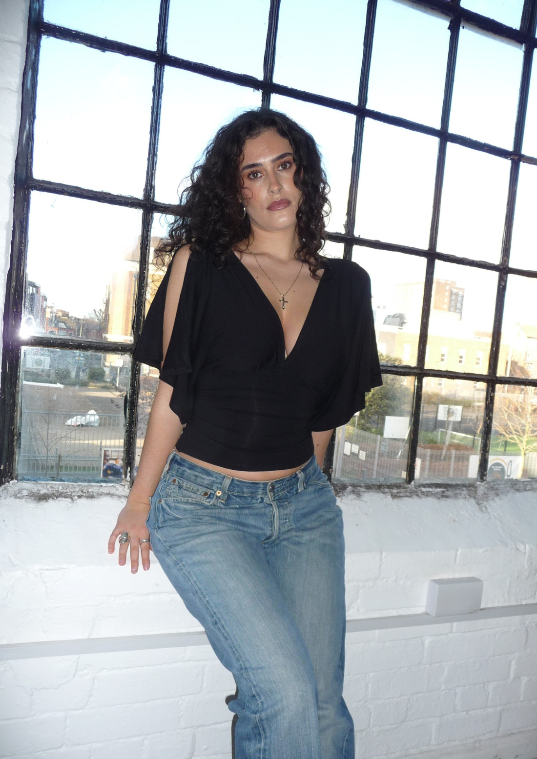 The Yasmin plunge split sleeve top in Black